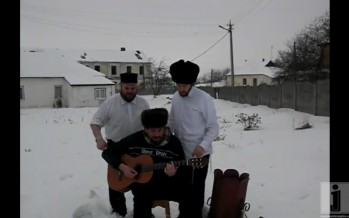 Shlomie Gertner, Gershy Moskowitz, and a guitarist Dancing away in Mezibush