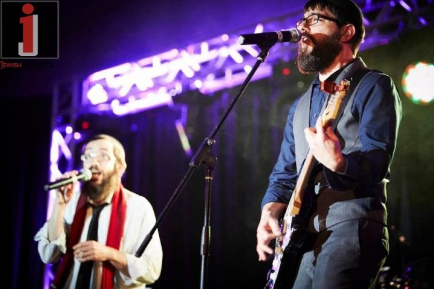 Shmuel and Bentzi of 8th Day rock the stage at a recent concert